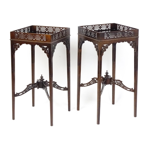 1711 - A pair of 19thC mahogany Chinese Chippendale side tables with pierced upstands above pierced apron b... 