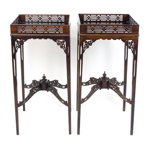 1711 - A pair of 19thC mahogany Chinese Chippendale side tables with pierced upstands above pierced apron b... 