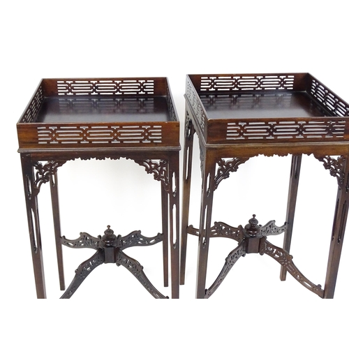 1711 - A pair of 19thC mahogany Chinese Chippendale side tables with pierced upstands above pierced apron b... 