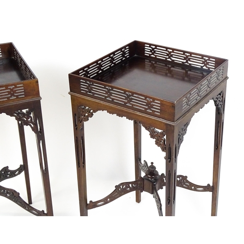 1711 - A pair of 19thC mahogany Chinese Chippendale side tables with pierced upstands above pierced apron b... 