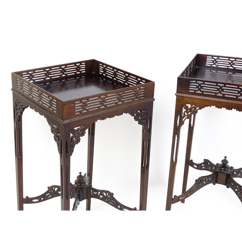 1711 - A pair of 19thC mahogany Chinese Chippendale side tables with pierced upstands above pierced apron b... 