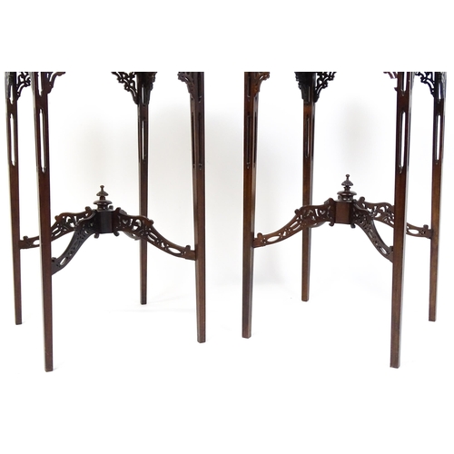 1711 - A pair of 19thC mahogany Chinese Chippendale side tables with pierced upstands above pierced apron b... 