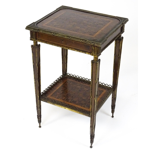 1712 - A 19thC marquetry inlaid side table with moulded metal mounts, a crossbanded top with marquetry inla... 