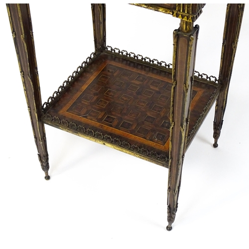 1712 - A 19thC marquetry inlaid side table with moulded metal mounts, a crossbanded top with marquetry inla... 