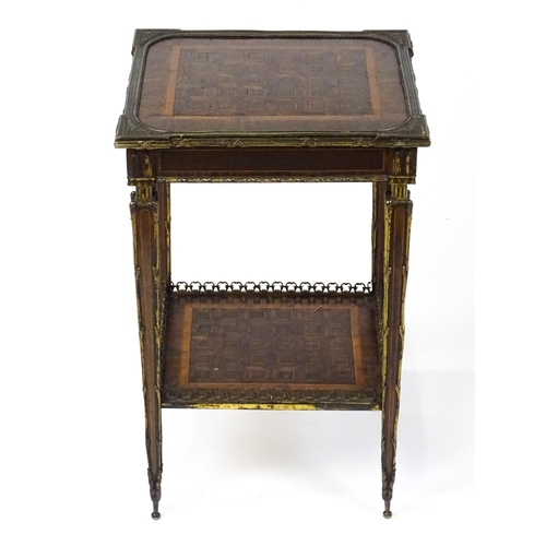 1712 - A 19thC marquetry inlaid side table with moulded metal mounts, a crossbanded top with marquetry inla... 