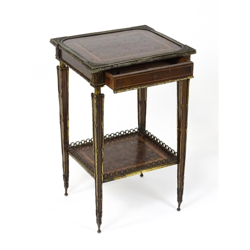 1712 - A 19thC marquetry inlaid side table with moulded metal mounts, a crossbanded top with marquetry inla... 