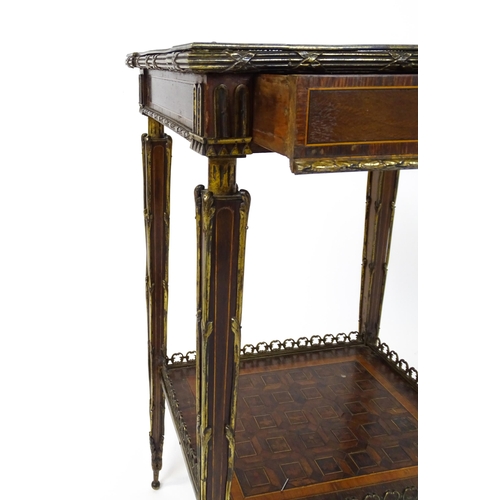 1712 - A 19thC marquetry inlaid side table with moulded metal mounts, a crossbanded top with marquetry inla... 