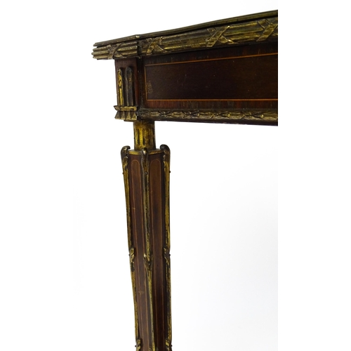 1712 - A 19thC marquetry inlaid side table with moulded metal mounts, a crossbanded top with marquetry inla... 