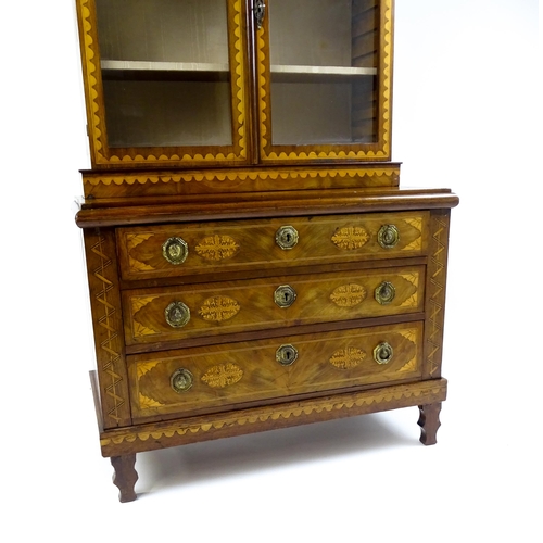 1715 - A 19thC mahogany glazed top bookcase with a moulded cornice above two glazed doors, the super struct... 