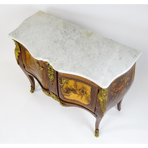 1717 - A late 19thC kingwood bombe commode with a serpentine front. The cabinet produced by the late 19thC ... 