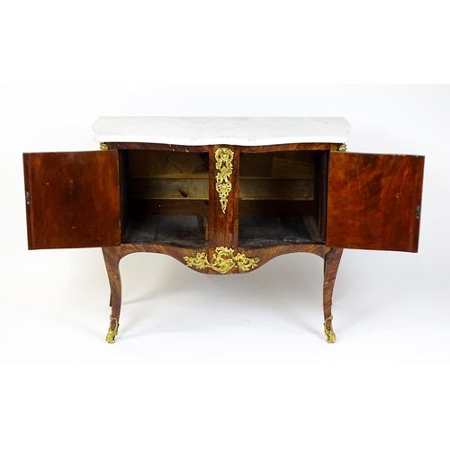 1717 - A late 19thC kingwood bombe commode with a serpentine front. The cabinet produced by the late 19thC ... 