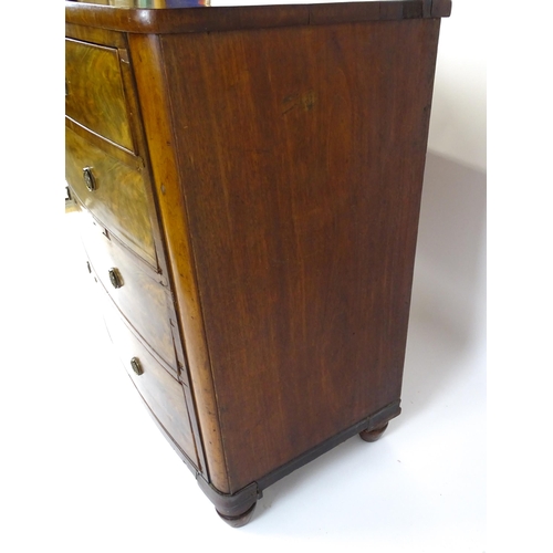 1743 - A 19thC mahogany bow fronted chest of drawers comprising two short over three long graduated drawers... 