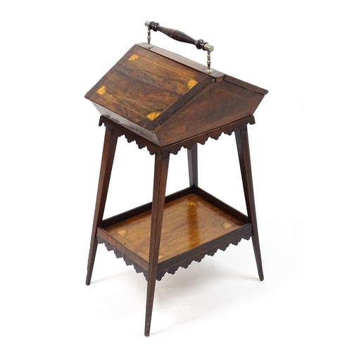 1755 - A 19thC rosewood sewing table with a carrying handle above two hinged lids with satinwood marquetry ... 