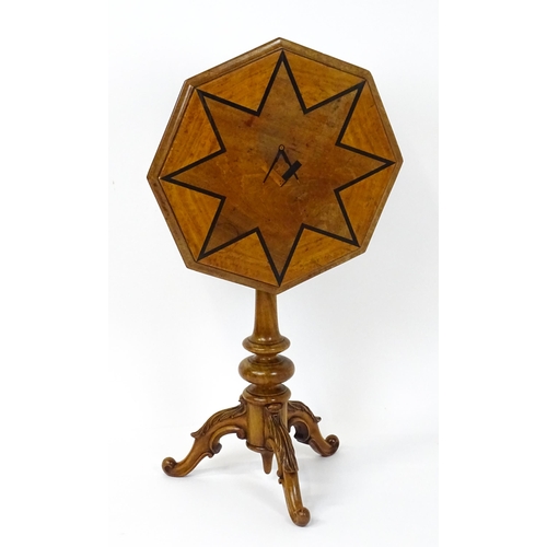 1759 - A 19thC occasional table with an octagonal satinwood tilt top, the top having an inlaid eight pointe... 