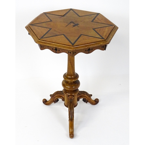 1759 - A 19thC occasional table with an octagonal satinwood tilt top, the top having an inlaid eight pointe... 