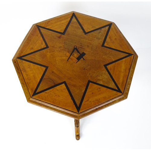 1759 - A 19thC occasional table with an octagonal satinwood tilt top, the top having an inlaid eight pointe... 