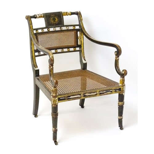 1761 - A Regency open armchair with a green painted and gilt finish. The chair having a painted armorial to... 