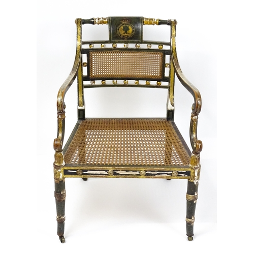 1761 - A Regency open armchair with a green painted and gilt finish. The chair having a painted armorial to... 