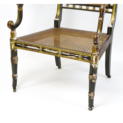 1761 - A Regency open armchair with a green painted and gilt finish. The chair having a painted armorial to... 