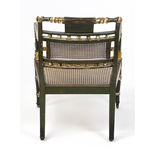 1761 - A Regency open armchair with a green painted and gilt finish. The chair having a painted armorial to... 