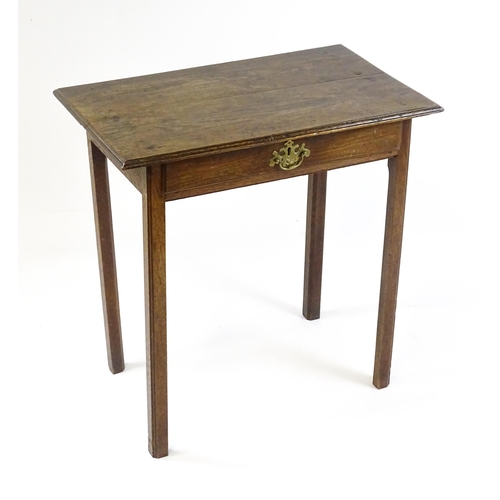 1795 - A 19thC oak peg jointed side table with a single frieze drawer raised on four straight legs. 28