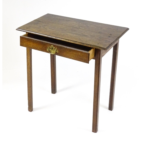 1795 - A 19thC oak peg jointed side table with a single frieze drawer raised on four straight legs. 28