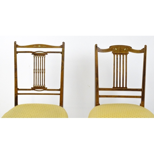 1798 - Two late 19thC rosewood side chairs with floral marquetry decoration, pierced back splat and raised ... 