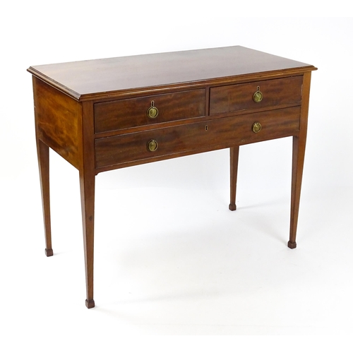 1799 - A late 19thC mahogany sideboard with two short drawers above a single long drawer with ring pull han... 