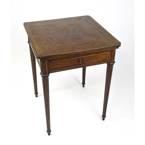 1809 - A 19thC mahogany envelope card table with two frieze drawers raised on four turned tapering and reed... 