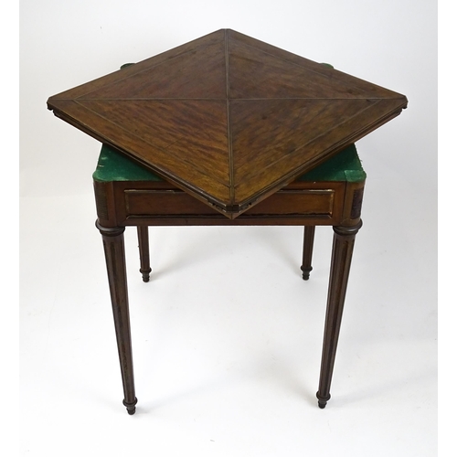 1809 - A 19thC mahogany envelope card table with two frieze drawers raised on four turned tapering and reed... 