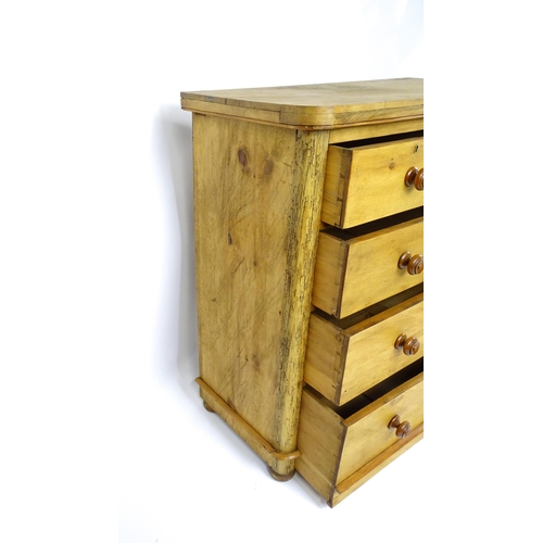 1811 - A late Victorian pine chest of drawers comprising two short over three long graduated drawers with t... 