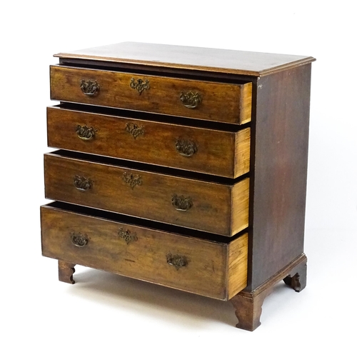 1813 - A Georgian mahogany chest of drawers comprising four long drawers with swan neck handles and pierced... 