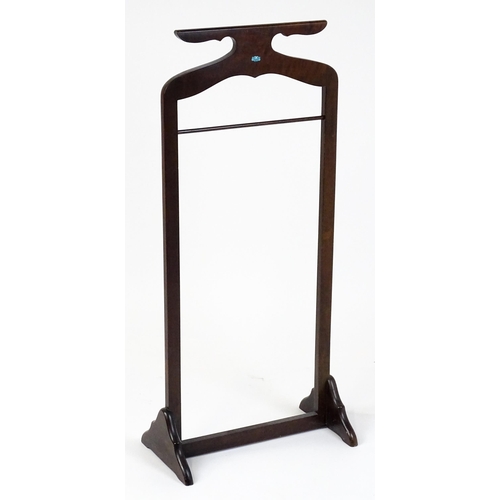 1814 - An early / mid 20thC valet stand of mahogany construction. 41