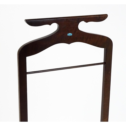 1814 - An early / mid 20thC valet stand of mahogany construction. 41