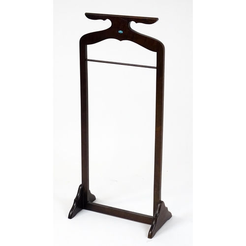 1814 - An early / mid 20thC valet stand of mahogany construction. 41