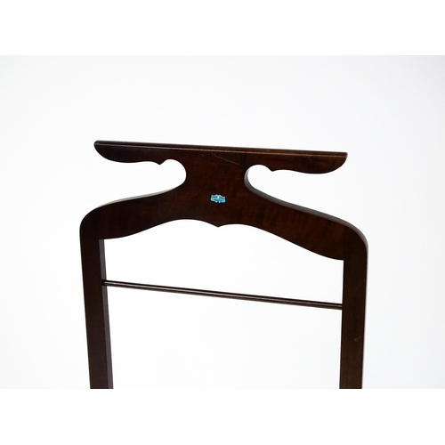 1814 - An early / mid 20thC valet stand of mahogany construction. 41