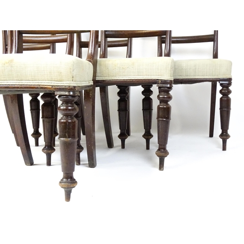 1815 - A set of six Victorian mahogany balloon back dining chairs raised on turned tapering front legs. 18