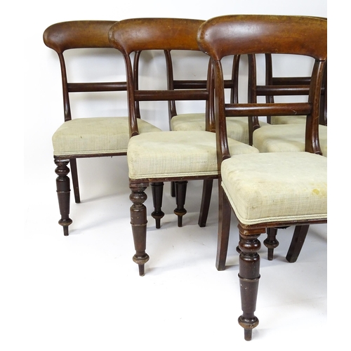 1815 - A set of six Victorian mahogany balloon back dining chairs raised on turned tapering front legs. 18