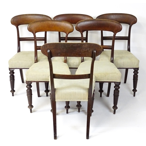 1815 - A set of six Victorian mahogany balloon back dining chairs raised on turned tapering front legs. 18