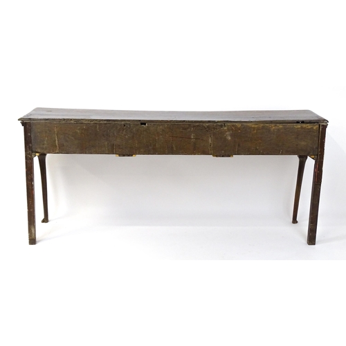 1818 - An 18thC oak dresser base with brass swan neck handles and back plates, the dresser raised on cabrio... 