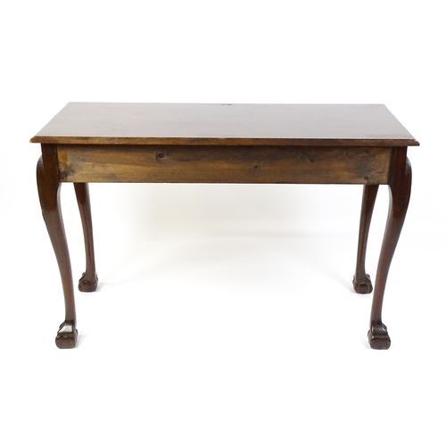 1819 - An antique Irish console table with a gadrooned top edge above a floral and shell carved apron raise... 