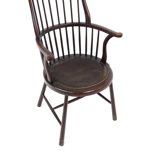 1829 - An Arts & Crafts c. 1900 Windsor chair in the manner of Liberty & Co. The chair having a bowed stick... 