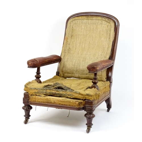 1841 - A William IV mahogany reclining armchair with leather upholstered armrests and raised on turned tape... 