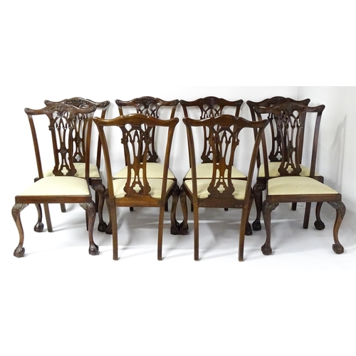 1862 - A set of 14 early / mid 20thC Chippendale style mahogany dining chairs (12+2). The chairs having car... 