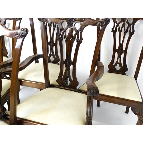 1862 - A set of 14 early / mid 20thC Chippendale style mahogany dining chairs (12+2). The chairs having car... 