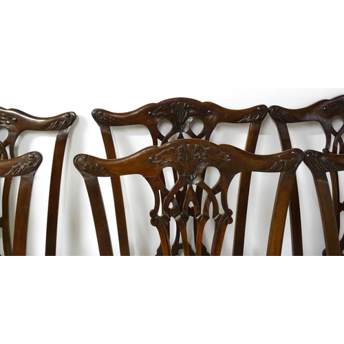 1862 - A set of 14 early / mid 20thC Chippendale style mahogany dining chairs (12+2). The chairs having car... 