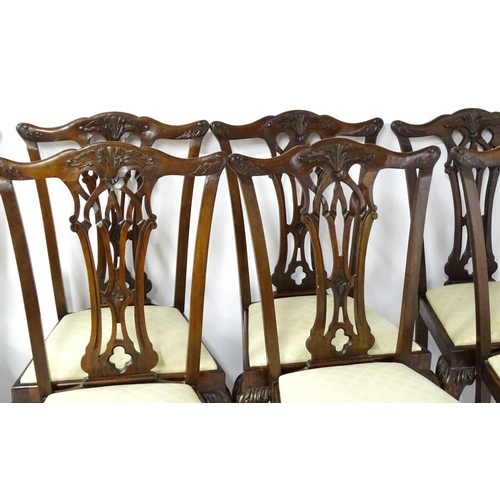 1862 - A set of 14 early / mid 20thC Chippendale style mahogany dining chairs (12+2). The chairs having car... 