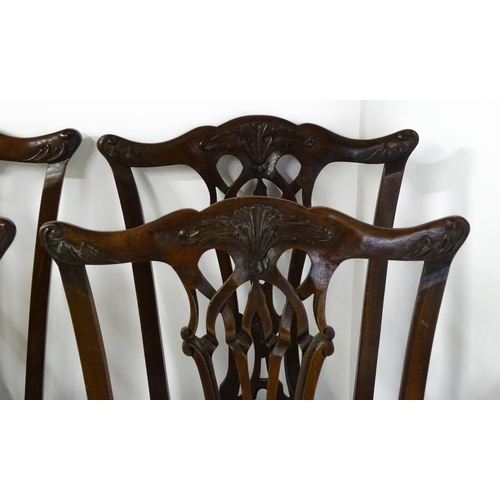 1862 - A set of 14 early / mid 20thC Chippendale style mahogany dining chairs (12+2). The chairs having car... 