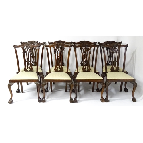 1862 - A set of 14 early / mid 20thC Chippendale style mahogany dining chairs (12+2). The chairs having car... 