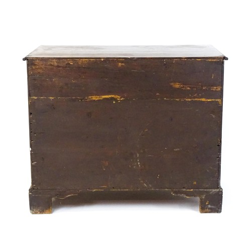 1736 - A Georgian mahogany chest of drawers with a moulded top above two short over two long drawers with s... 